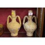 A pair of Greek pottery vases