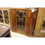 A mahogany and glazed cabinet