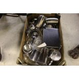 A box of stainless steel teapots, Pyrex items etc.