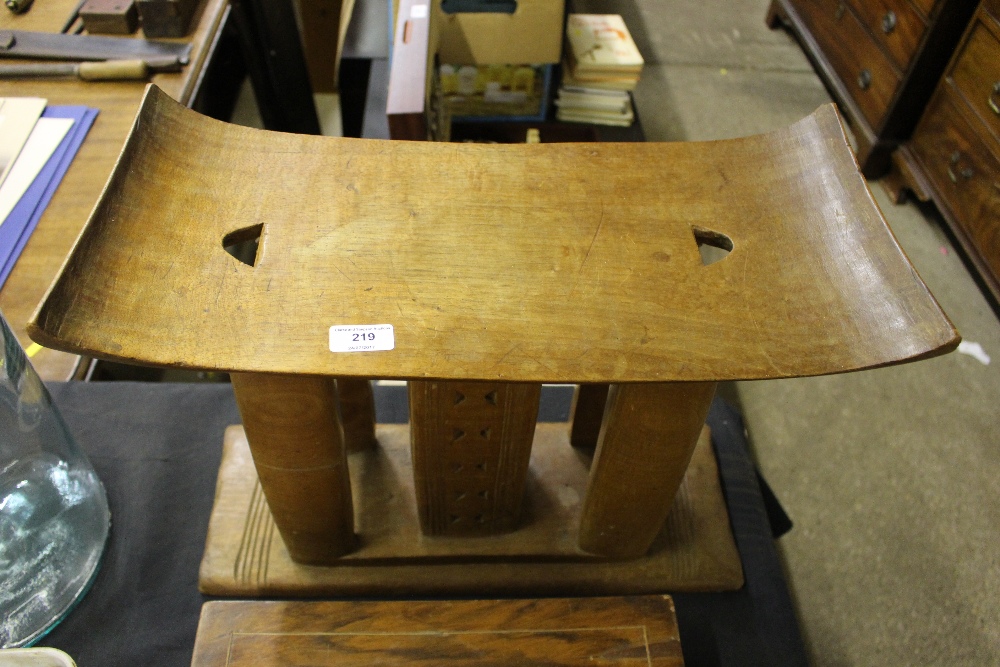 An African carved wooden stool