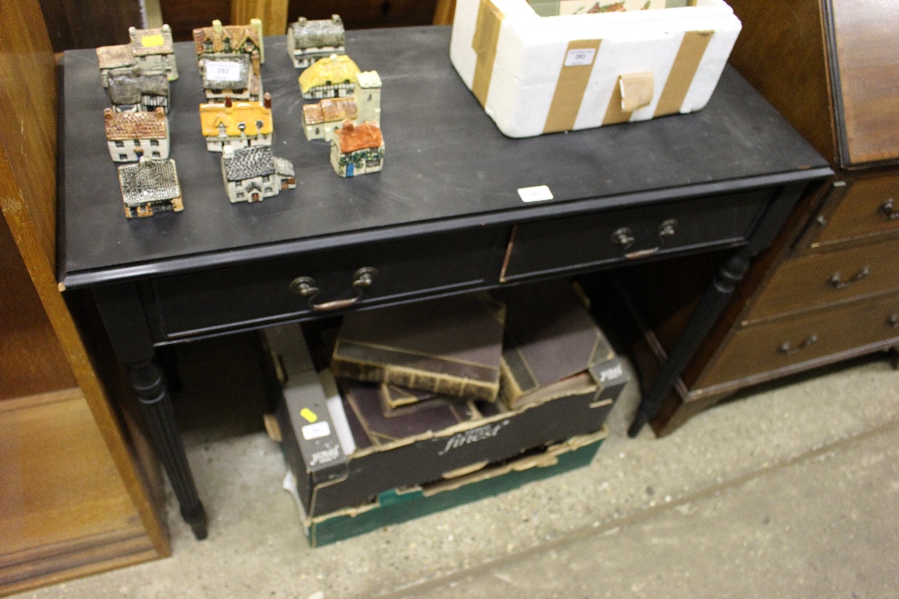 A black painted two drawer side table