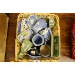 A basket of Wedgwood jasperware china, tiles etc.