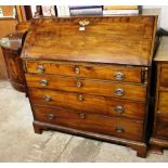 A George III mahogany bureau fitted four long draw