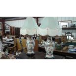 A pair of oriental design table lamps and shades