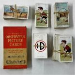 A small collection of cigarette cards