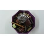 A box of costume jewellery, thimbles, a compact et