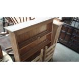 A stripped pine plate rack