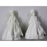 A pair of white glazed figurines