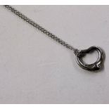 A Tiffany silver necklace hung with a heart shaped