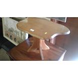 A small wooden occasional table