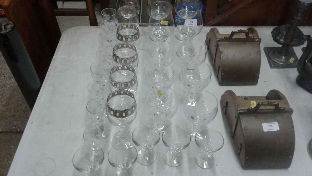 A quantity of various drinking glasses to include