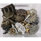 A box of military hat badges