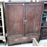 A 19th Century oak press cupboard fitted single dr