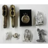 Two pairs of brass nut crackers; various owl ornam