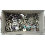 A box of various costume jewellery