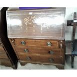 An Edwardian mahogany and inlaid three drawer bure