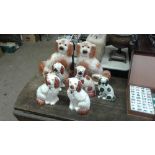 Three pairs of Staffordshire style spaniels; and o