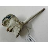 A large Victorian style clay Christmas pipe