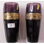 A pair of amethyst glass vases with gilt metal ban