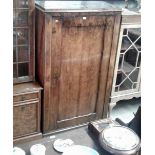 A 19th Century continental walnut cupboard (conver