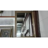 A gilt framed and bevel edged wall mirror