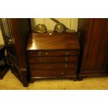 A Georgian mahogany bureau fitted four long drawer