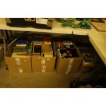 Four boxes of various books