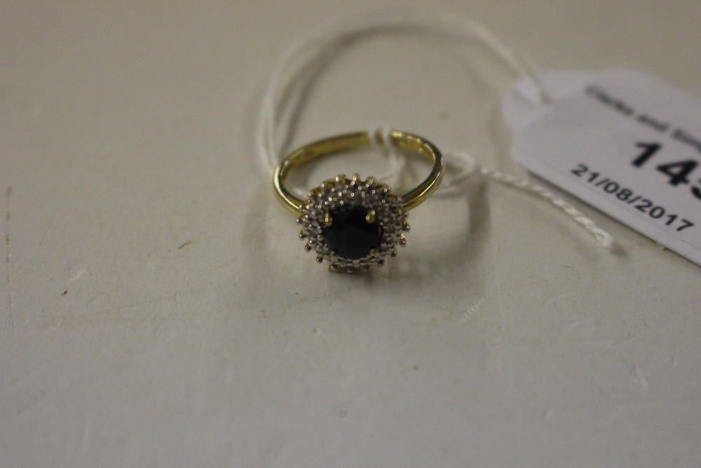 A 9ct gold cluster ring