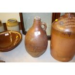 An antique stoneware flagon