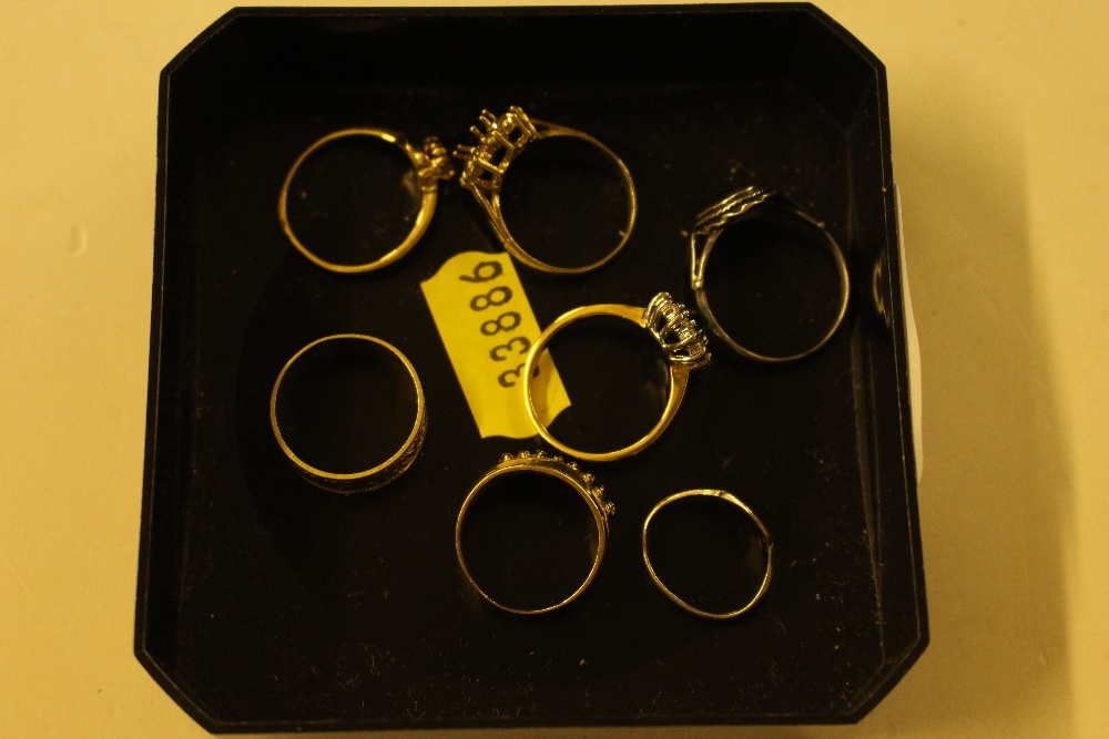 Seven various rings to include a silver and Blue J