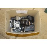 A box of various cameras