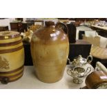 A large stoneware 6 gallon flagon