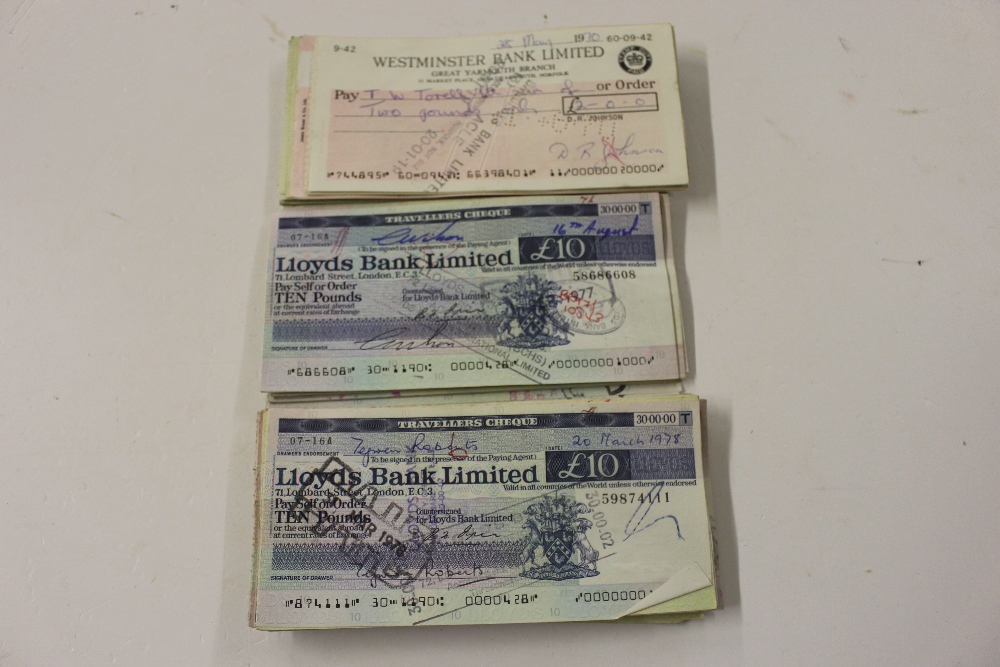 A bundle of old used cheques