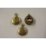 Three various pocket watches