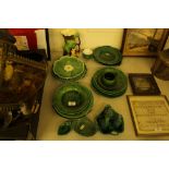 A quantity of green glazed leaf plates, a Hornsea