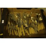 A box of various cutlery