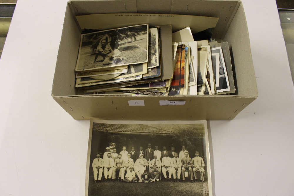 A box of family photos, Army Ceylon ect, from Que