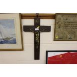 An oak and brass crucifix