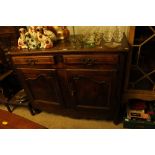 A 19th Century French fruit wood buffet fitted two