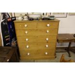 A large Victorian stripped pine chest fitted two s