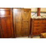 A 1930's oak double wardrobe