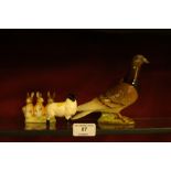 A Beswick pigeon; together with a Beswick sheep; a