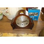 A 1930's soak cased three hole mantel clock