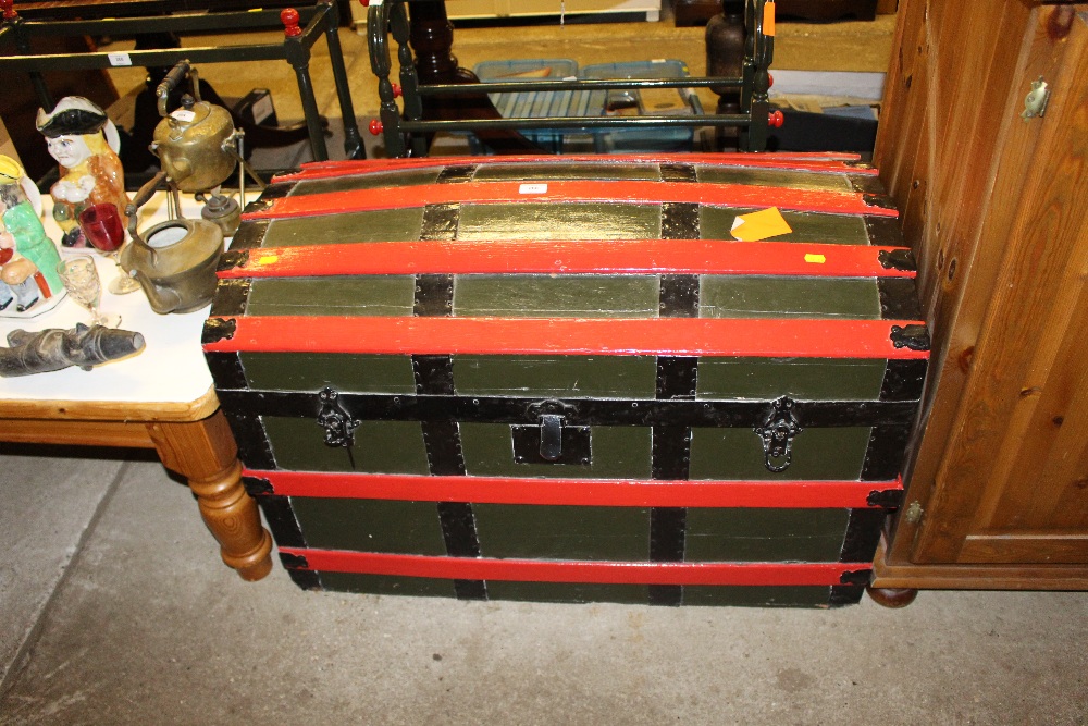 A painted wooden bound dome topped trunk