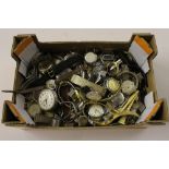 A box of various watches and watch parts