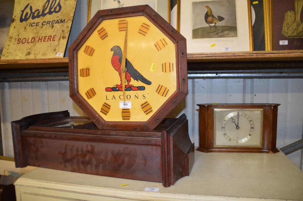 Two wall clocks and a mantel clock