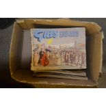 A box of Giles annuals