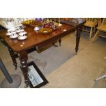 A 19th Century mahogany extending dining table rai