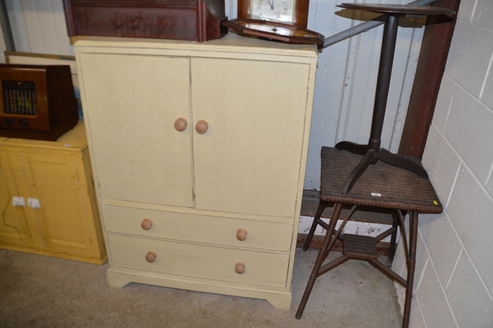 A painted tall boy fitted two drawers