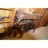 A Victorian carved oak hall table